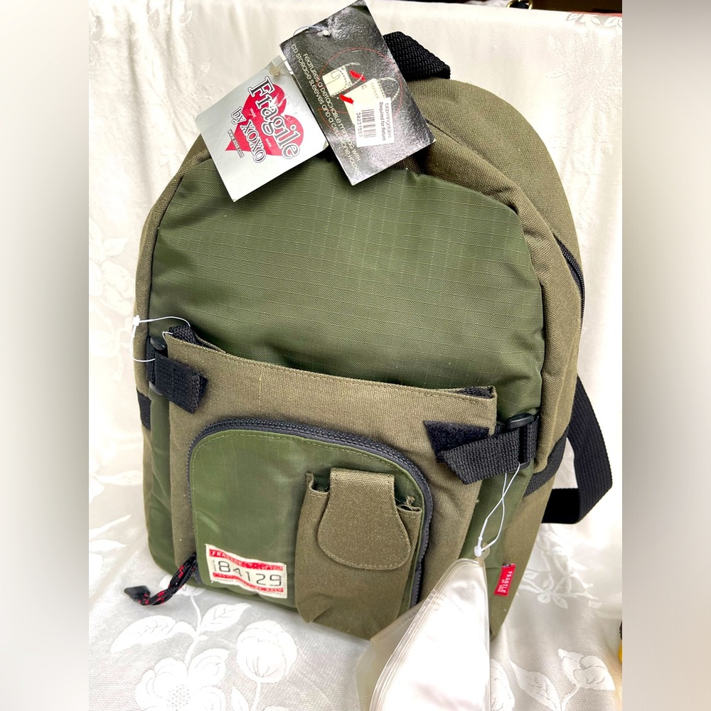 Fragile by XOXO backpack NWT
Fun and comfortable army green